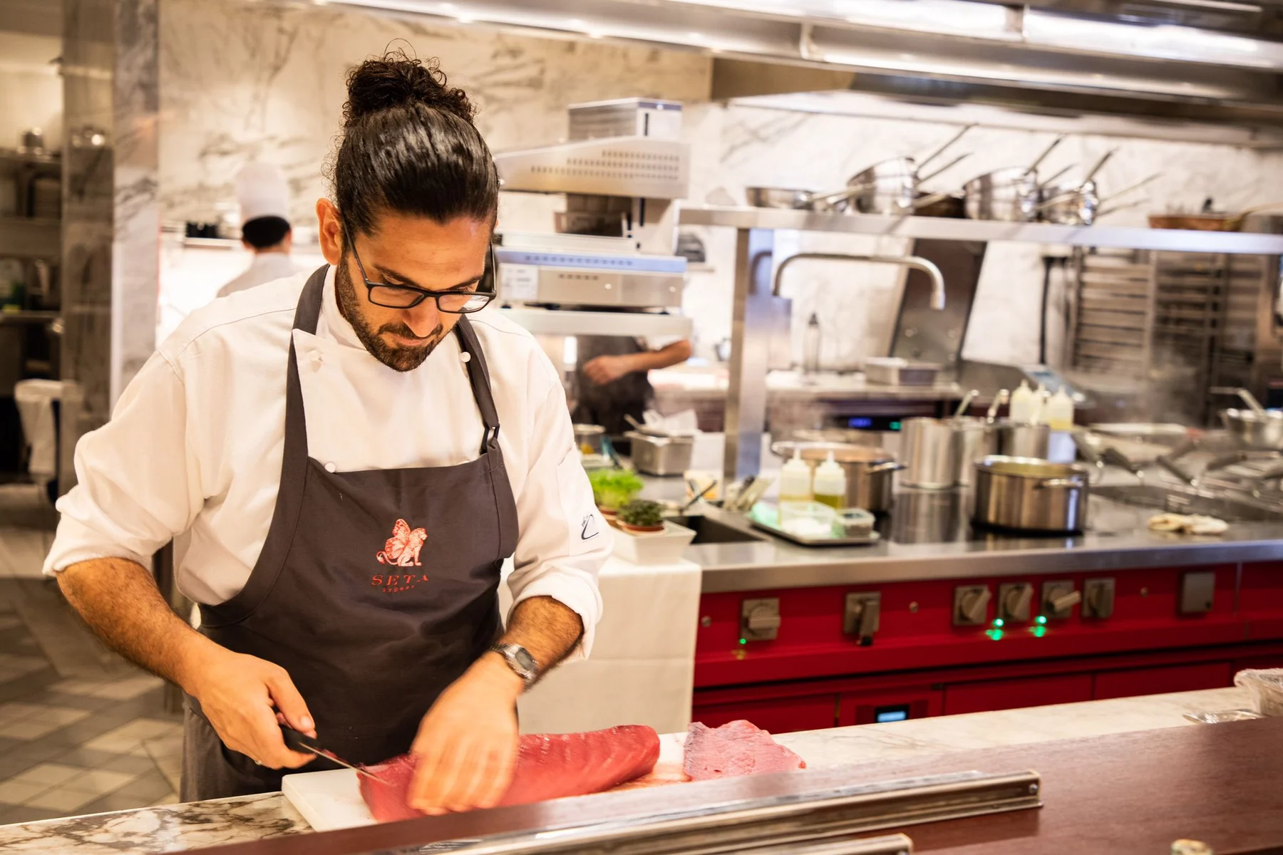 Davide working in a professional kitchen
